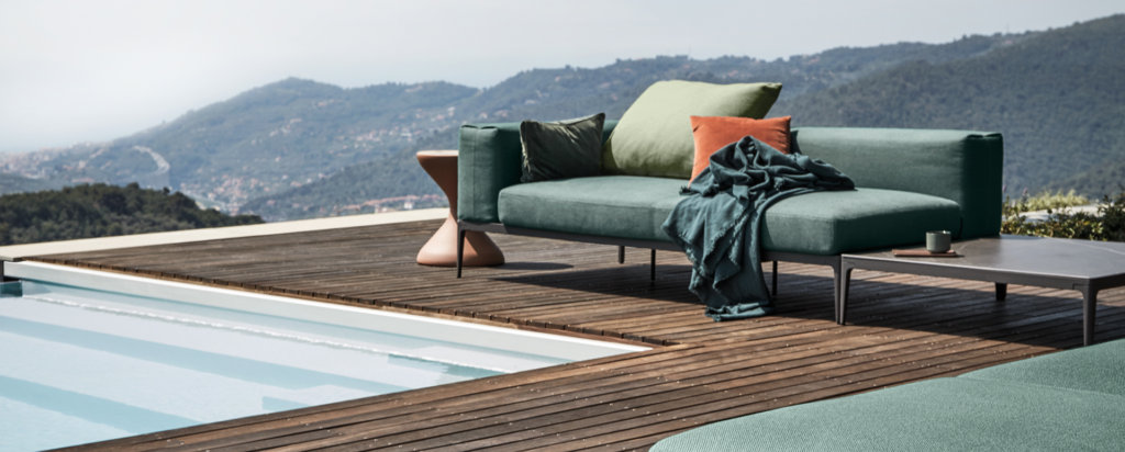 Gloster outdoor furniture with a mountain range in the background
